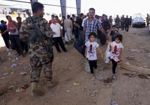 iraq-mosul-cristiani-fuga-isil